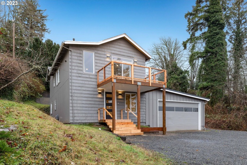 Perched on a private lot sits this newly updated home. Take in - Beach Home for sale in Astoria, Oregon on Beachhouse.com