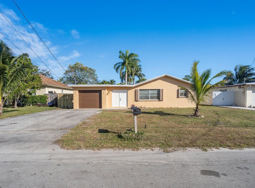 Welcome to your dream home! This beautifully renovated 3-bedroom - Beach Home for sale in Lake Worth Beach, Florida on Beachhouse.com