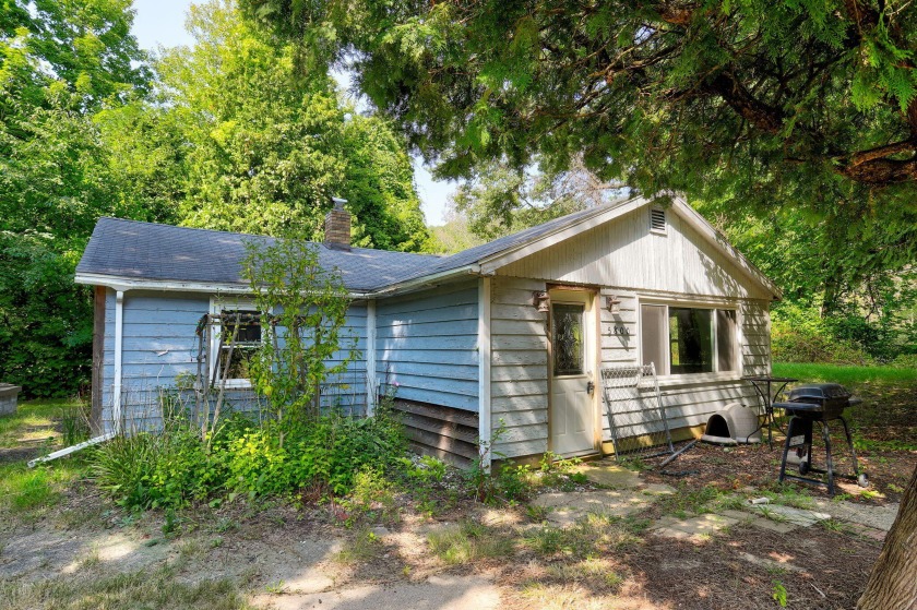 Discover a unique opportunity to own a charming 3-bedroom home - Beach Home for sale in Coloma, Michigan on Beachhouse.com