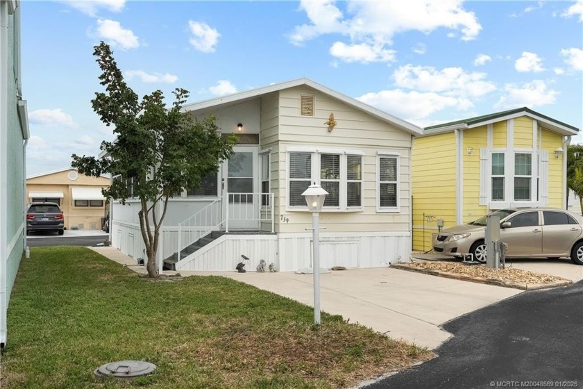 Cute Beach Bungalow with peekaboo water views on Hutchinson - Beach Home for sale in Jensen Beach, Florida on Beachhouse.com