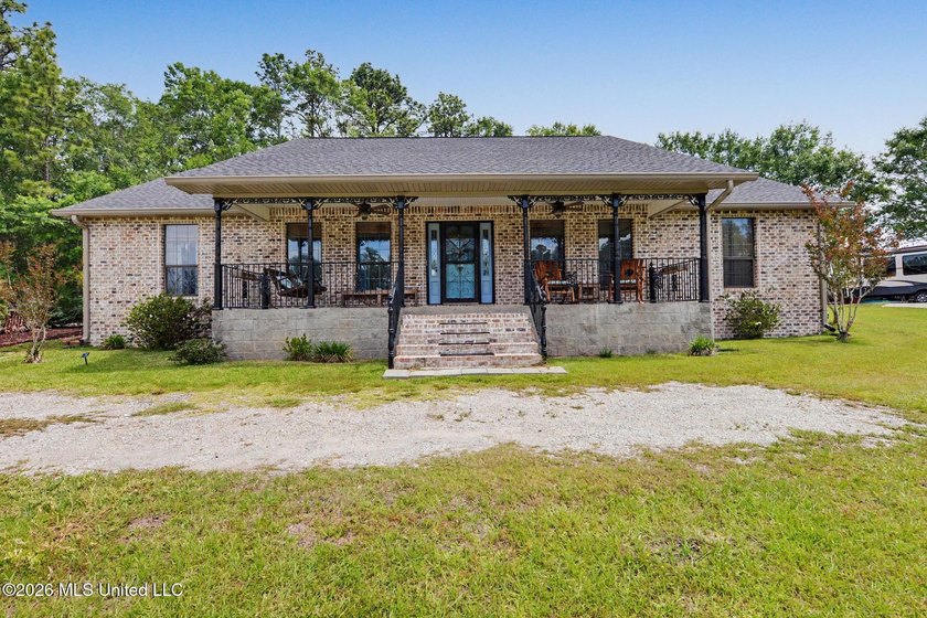 Two homes, three parcels, stocked ponds, saltwater pool, hot tub - Beach Home for sale in Gulfport, Mississippi on Beachhouse.com