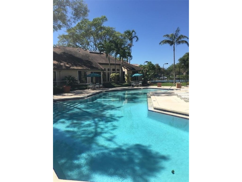 Large 2/2 with a garden View, large balcony with storage - Beach Condo for sale in Pompano Beach, Florida on Beachhouse.com