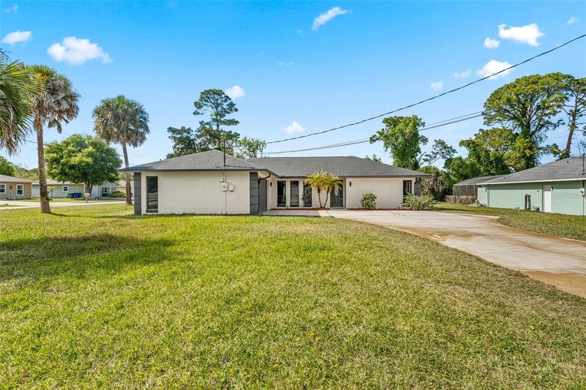 Fully renovated 3-bedroom, 2-bathroom home situated on an - Beach Home for sale in Edgewater, Florida on Beachhouse.com