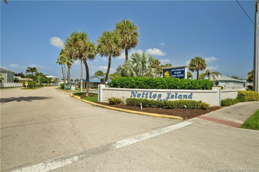 Nestled on Nettles Island, a picturesque guard-gated river - Beach Home for sale in Jensen Beach, Florida on Beachhouse.com