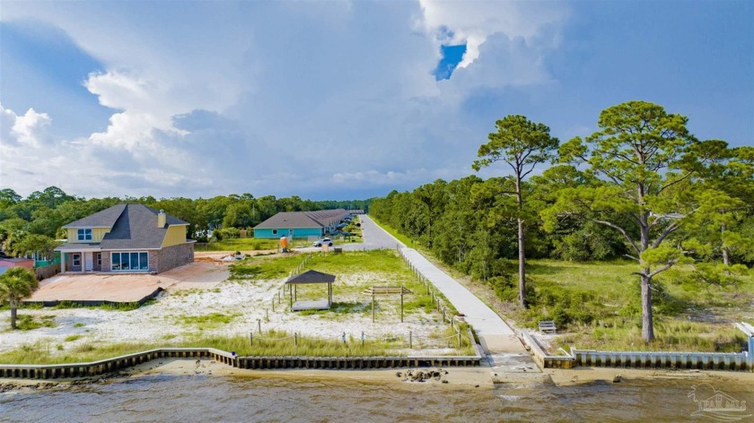 Imagine life on a stunning 50' wide waterfront lot, where the - Beach Lot for sale in Navarre, Florida on Beachhouse.com