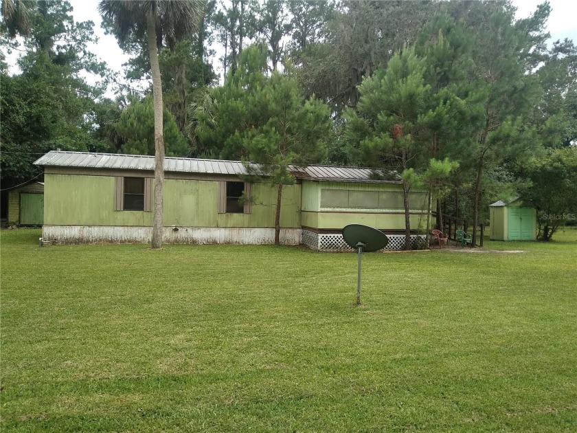 Single Wide on .46 Acres needs TLC.  A few minutes walk to Lake - Beach Home for sale in Crystal River, Florida on Beachhouse.com