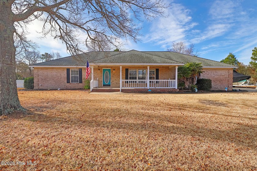 This inviting 3-bedroom, 2.5-bath brick home offers generous - Beach Home for sale in Morehead City, North Carolina on Beachhouse.com