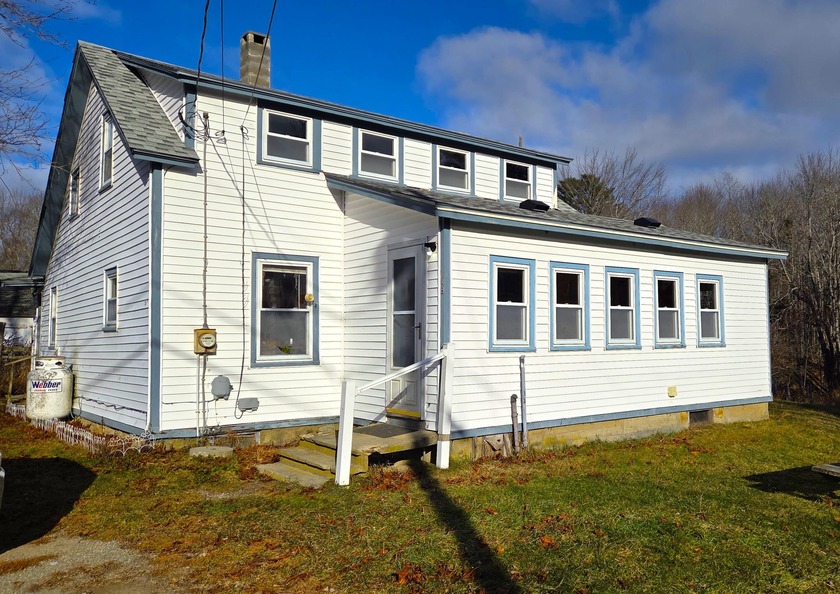 Nestled in a picturesque setting, this charming homestead offers - Beach Home for sale in Searsport, Maine on Beachhouse.com