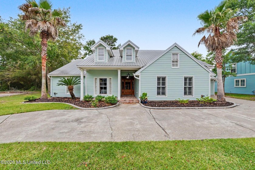 Experience coastal living at its finest in this beautifully - Beach Home for sale in Waveland, Mississippi on Beachhouse.com