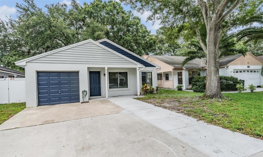 Welcome to your dream home by Lake St. George! This stunning - Beach Home for sale in Palm Harbor, Florida on Beachhouse.com