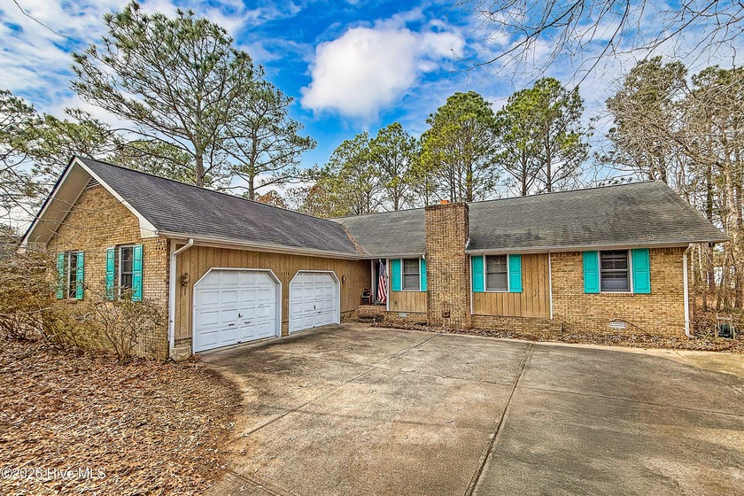 Tucked away on a wooded lot in Fairfield Harbour, this inviting - Beach Home for sale in New Bern, North Carolina on Beachhouse.com