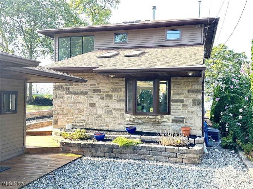 Fabulous contemporary lakefront home with beach and pier access - Beach Home for sale in Sheffield Lake, Ohio on Beachhouse.com