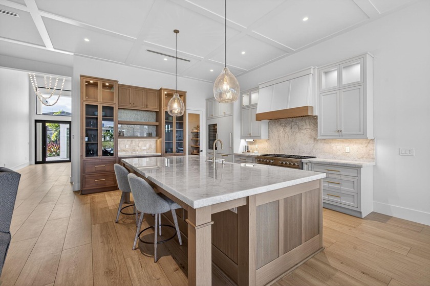 Stunning single-story home with long lake views in the gated - Beach Home for sale in Palm Beach Gardens, Florida on Beachhouse.com