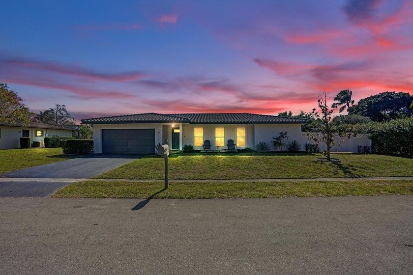 Welcome to this charming 4bed 2bath Pool home tucked away on a - Beach Home for sale in Coral Springs, Florida on Beachhouse.com