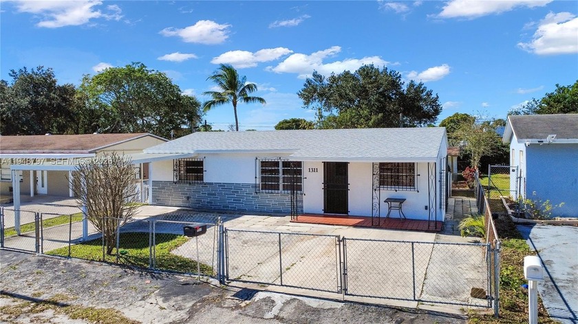 A must See 
Unlock the potential of this 3-bedroom, 2-bath home - Beach Home for sale in Fort Lauderdale, Florida on Beachhouse.com