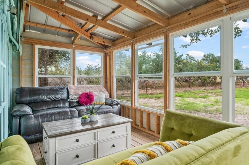 Escape to tranquility with this charming cabin on 2+ acres - Beach Home for sale in Aransas Pass, Texas on Beachhouse.com