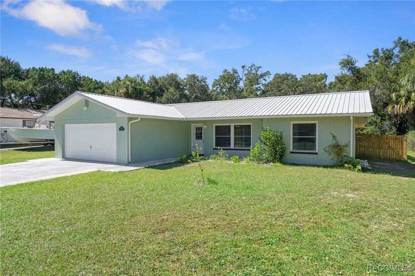 Unique Location - Move-In Ready! This beautifully renovated home - Beach Home for sale in Crystal River, Florida on Beachhouse.com