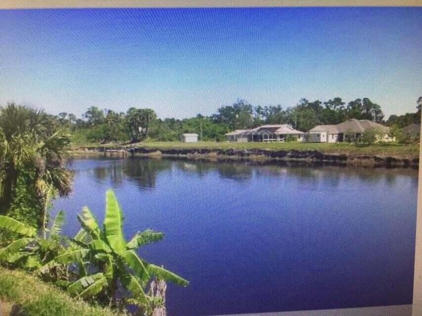 BEAUTIFUL LOT ON C-24 CANAL WITH FRESH WATER FISHING, JET SKIES - Beach Lot for sale in Port Saint Lucie, Florida on Beachhouse.com