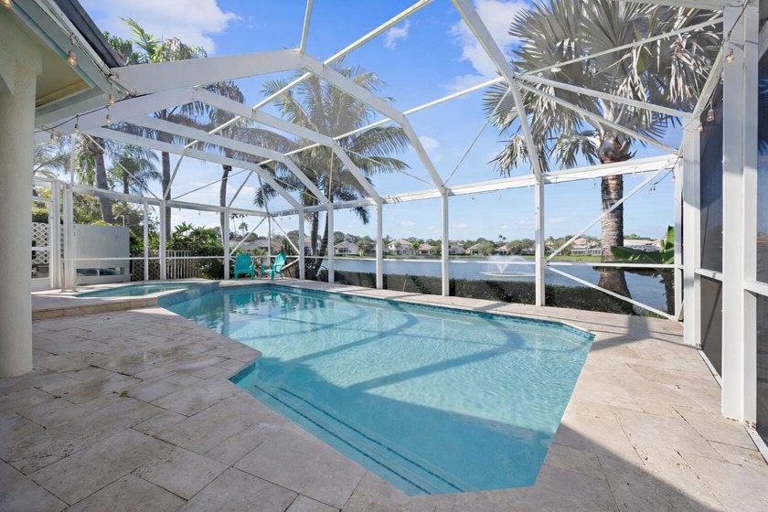 Lakefront living in Eagleton at PGA National. This beautifully - Beach Home for sale in Palm Beach Gardens, Florida on Beachhouse.com