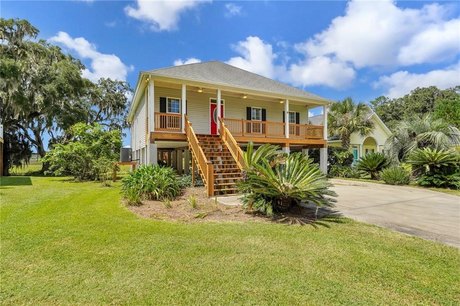 Stunning sunsets overlooking the marsh and White Chimney River - Beach Home for sale in Shellman Bluff, Georgia on Beachhouse.com