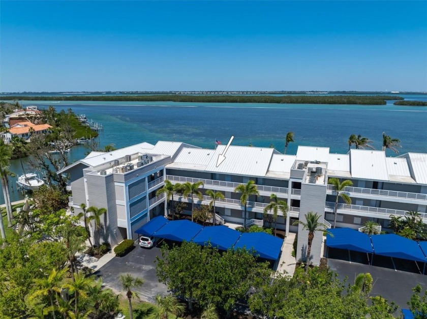 Welcome to Water Song, your slice of paradise at Harbour Villa - Beach Condo for sale in Longboat Key, Florida on Beachhouse.com