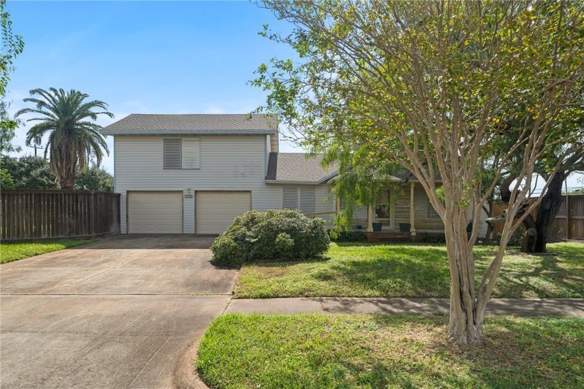 This charming 2-story coastal home seamlessly blends space and - Beach Home for sale in Aransas Pass, Texas on Beachhouse.com