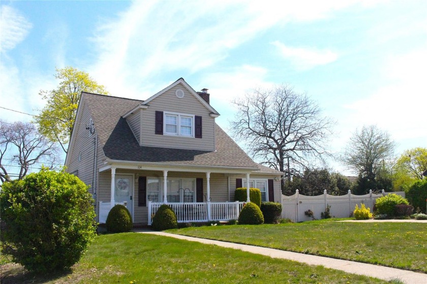 Welcome Home to this Beautiful Expanded Cape Cod Situated on a - Beach Home for sale in Lindenhurst, New York on Beachhouse.com