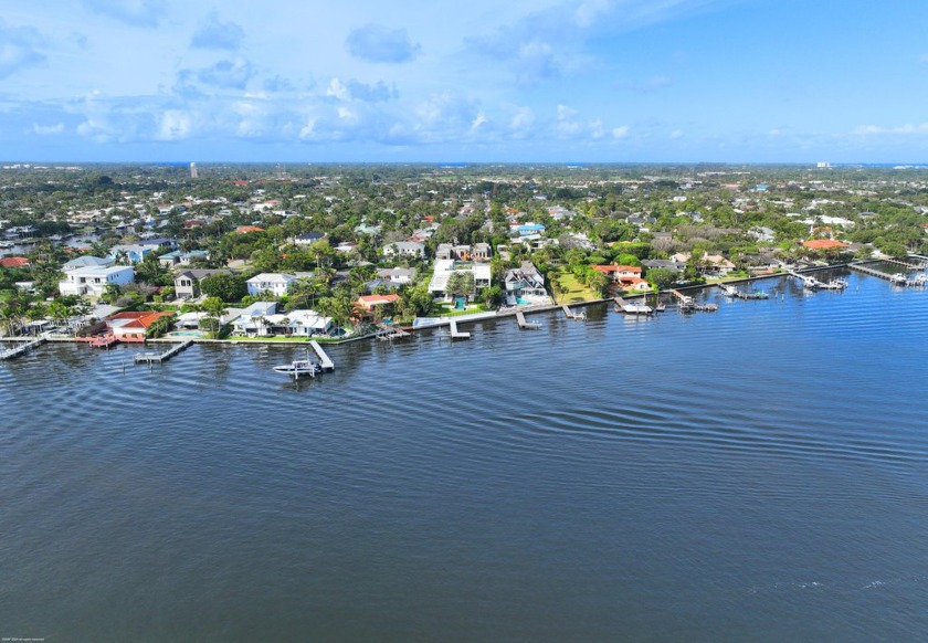 From the moment you enter the gates of this massive direct - Beach Home for sale in West Palm Beach, Florida on Beachhouse.com