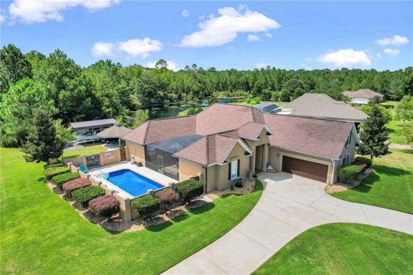 Step into luxury living with this exquisite property featuring a - Beach Home for sale in Brunswick, Georgia on Beachhouse.com