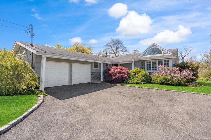 Welcome to 18 Fleets Point Drive with Deeded Boat Slip a Few - Beach Home for sale in West Babylon, New York on Beachhouse.com