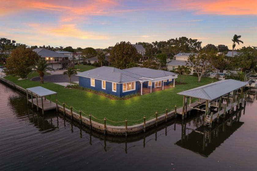 Tucked away on a serene cul-de-sac on coveted Snead Island, with - Beach Home for sale in Palmetto, Florida on Beachhouse.com
