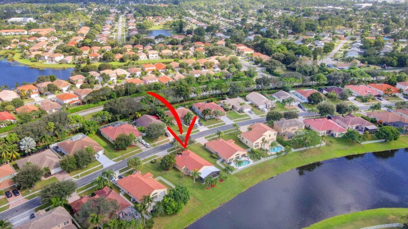 Stunning Lakefront 3BR/2BA Home in Desirable Winston Trails - - Beach Home for sale in Lake Worth, Florida on Beachhouse.com