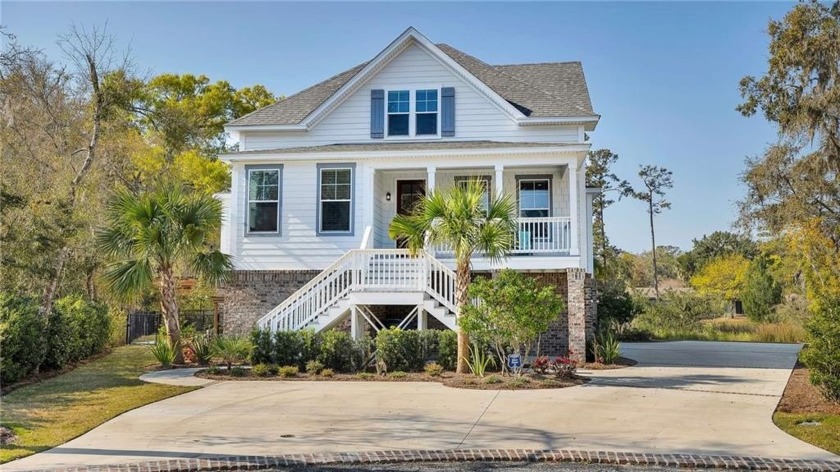 Stunning multi-level cottage located on the tidal marsh in St - Beach Home for sale in Saint Simons, Georgia on Beachhouse.com