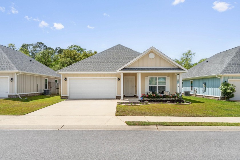 Welcome home to this inviting craftsman style 4 bedroom home - Beach Home for sale in Navarre, Florida on Beachhouse.com