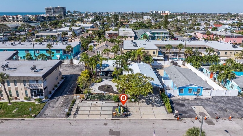 This distinctive triplex, located just a few blocks from the - Beach Townhome/Townhouse for sale in ST Pete Beach, Florida on Beachhouse.com