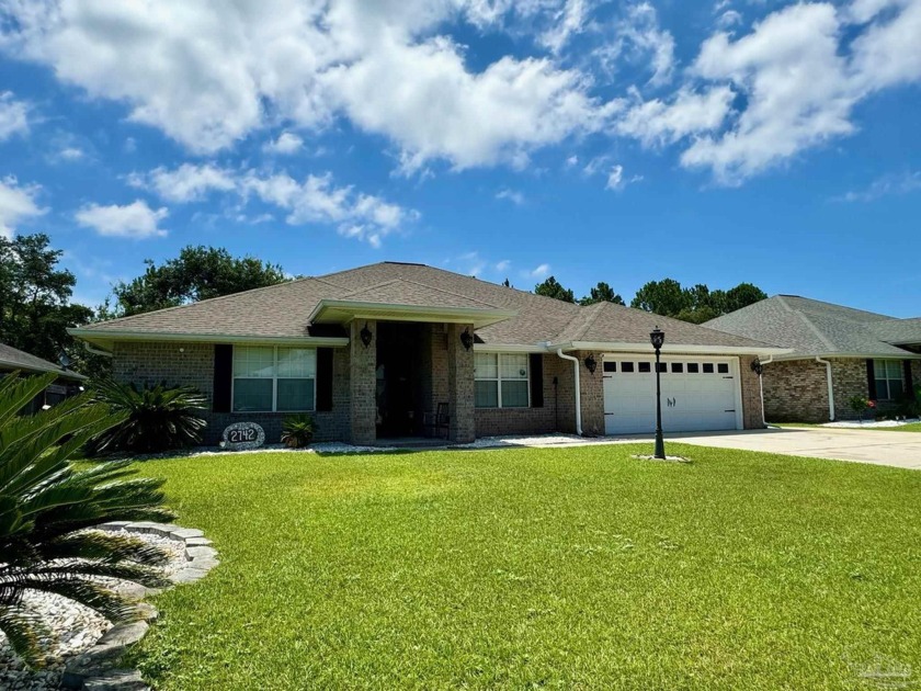 Nestled within the small community of Waterstone, with - Beach Home for sale in Navarre, Florida on Beachhouse.com