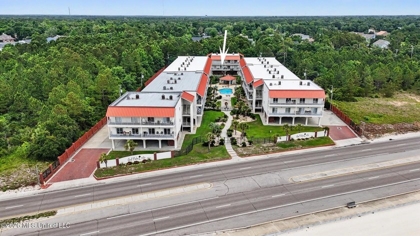 Welcome to refined coastal living at Gulf Palm Villas in this - Beach Condo for sale in Pass Christian, Mississippi on Beachhouse.com