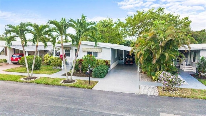 LOVELY UPGRADED MANUFACTURED HOME IN A LAND-OWNED ADULT - Beach Home for sale in Deerfield Beach, Florida on Beachhouse.com