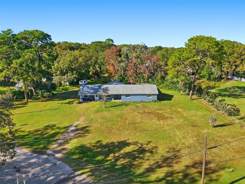 Welcome to a rare Florida find where vintage charm meets modern - Beach Home for sale in Land O Lakes, Florida on Beachhouse.com