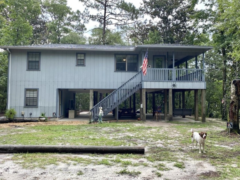 Gated secluded riverfront getaway with approximately 300 feet on - Beach Home for sale in Sopchoppy, Florida on Beachhouse.com