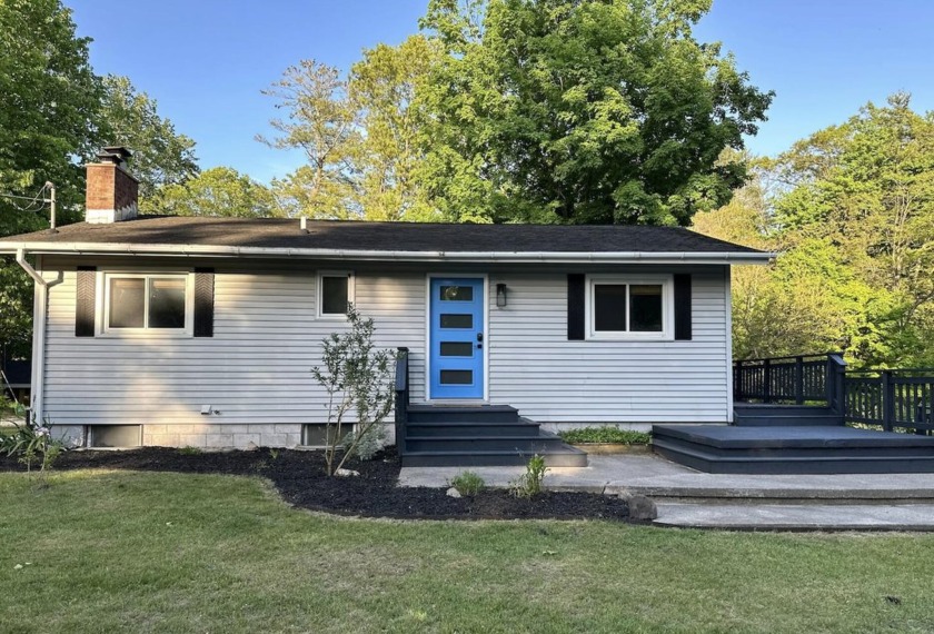 This delightful home, nestled in the picturesque Village of - Beach Home for sale in Pentwater, Michigan on Beachhouse.com