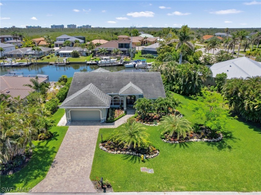Tropically landscaped for exceptional curb appeal both day and - Beach Home for sale in Fort Myers, Florida on Beachhouse.com