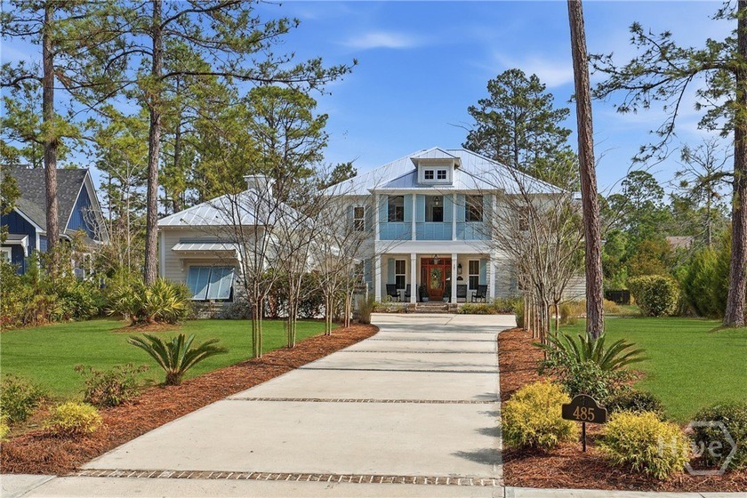 Experience elevated lagoon-front living in the heart of - Beach Home for sale in Richmond Hill, Georgia on Beachhouse.com