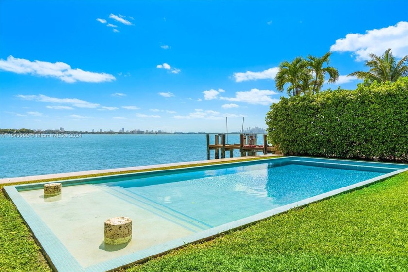 Discover downtown skyline views and the allure of 1660 Bay Dr, a - Beach Home for sale in Miami Beach, Florida on Beachhouse.com
