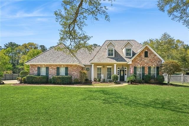 Stately, updated, and meticulously maintained home set on over - Beach Home for sale in Slidell, Louisiana on Beachhouse.com