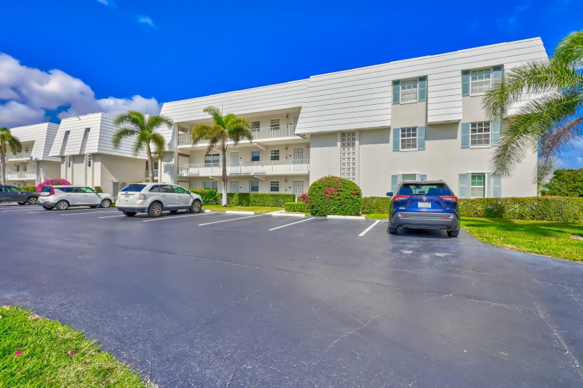 This highly coveted first floor corner unit with beautiful water - Beach Condo for sale in Riviera Beach, Florida on Beachhouse.com