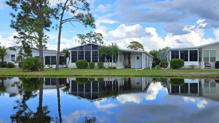 Welcome to your dream home in the exclusive Golf Course - Beach Home for sale in Punta Gorda, Florida on Beachhouse.com