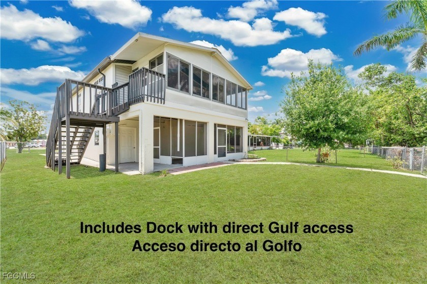 **SHORT SALE!** Light-filled corner home on the Caloosahatchee - Beach Home for sale in North Fort Myers, Florida on Beachhouse.com