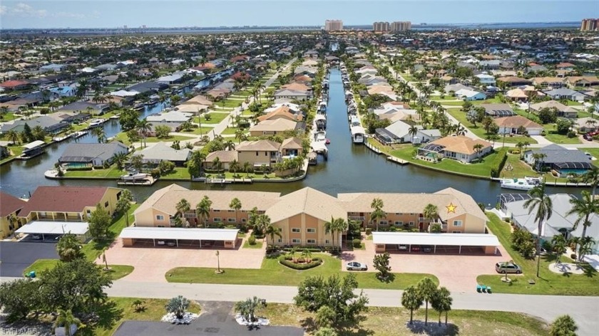 GULF ACCESS, CORNER UNIT with sweeping intersecting canal views - Beach Condo for sale in Cape Coral, Florida on Beachhouse.com