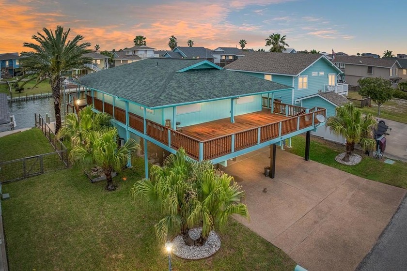 Waterfront Stilted Canal House with both canal and Bay Views - - Beach Home for sale in City by The Sea, Texas on Beachhouse.com